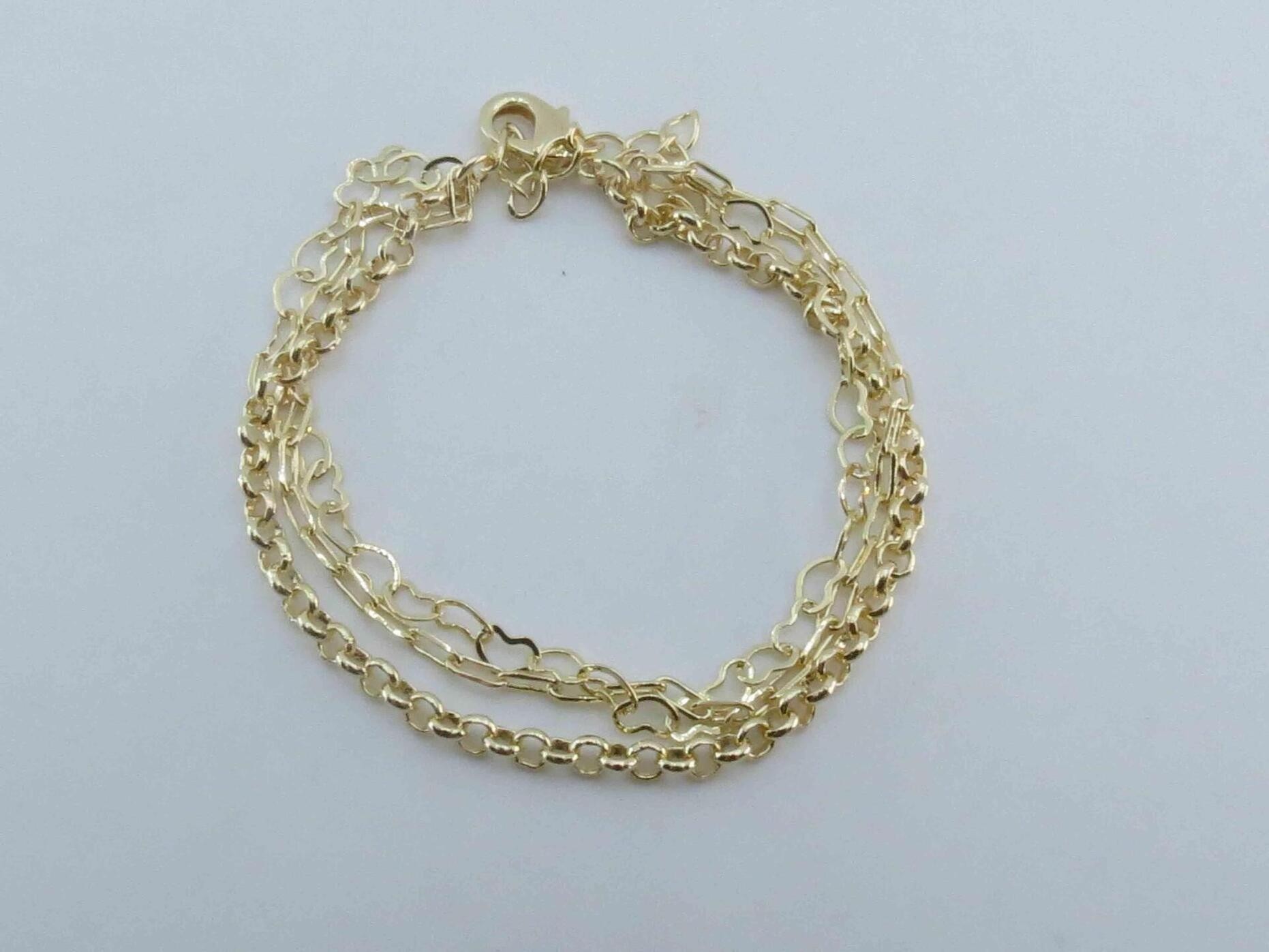 Pulseira tripla mix de elos folheado a ouro 18k